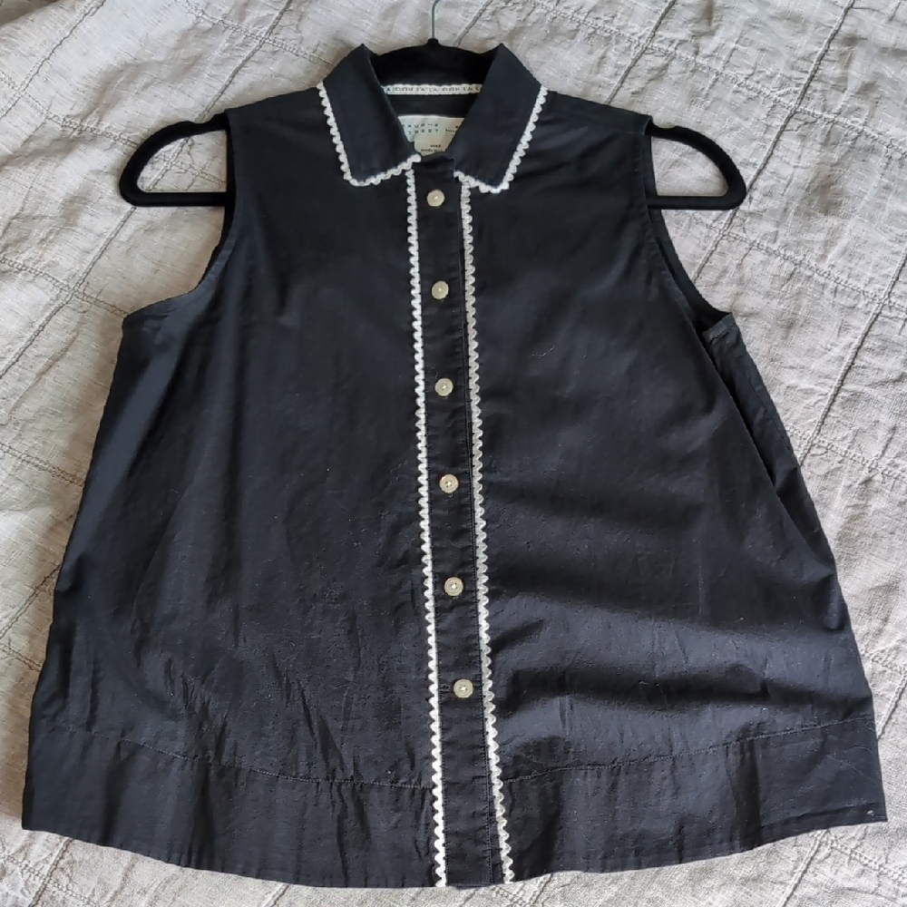 Black Sleeveless Top with White Trim